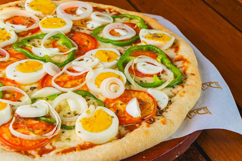 Buffalo Wing Stromboli rolled with chicken and hot sauce